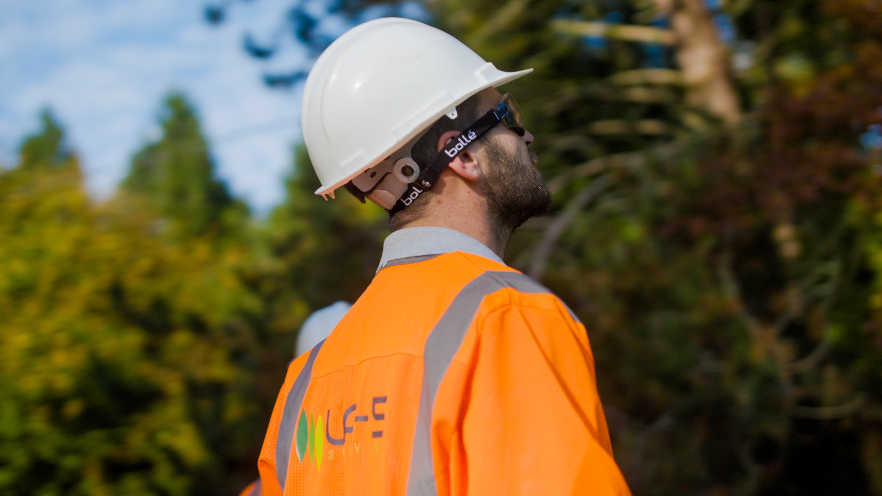UA-5 surveyor assessing vegetation near overhead lines